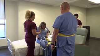 Physical Therapy Transfer Training  How To Transfer From Wheelchair To Bed [upl. by Yeldud]